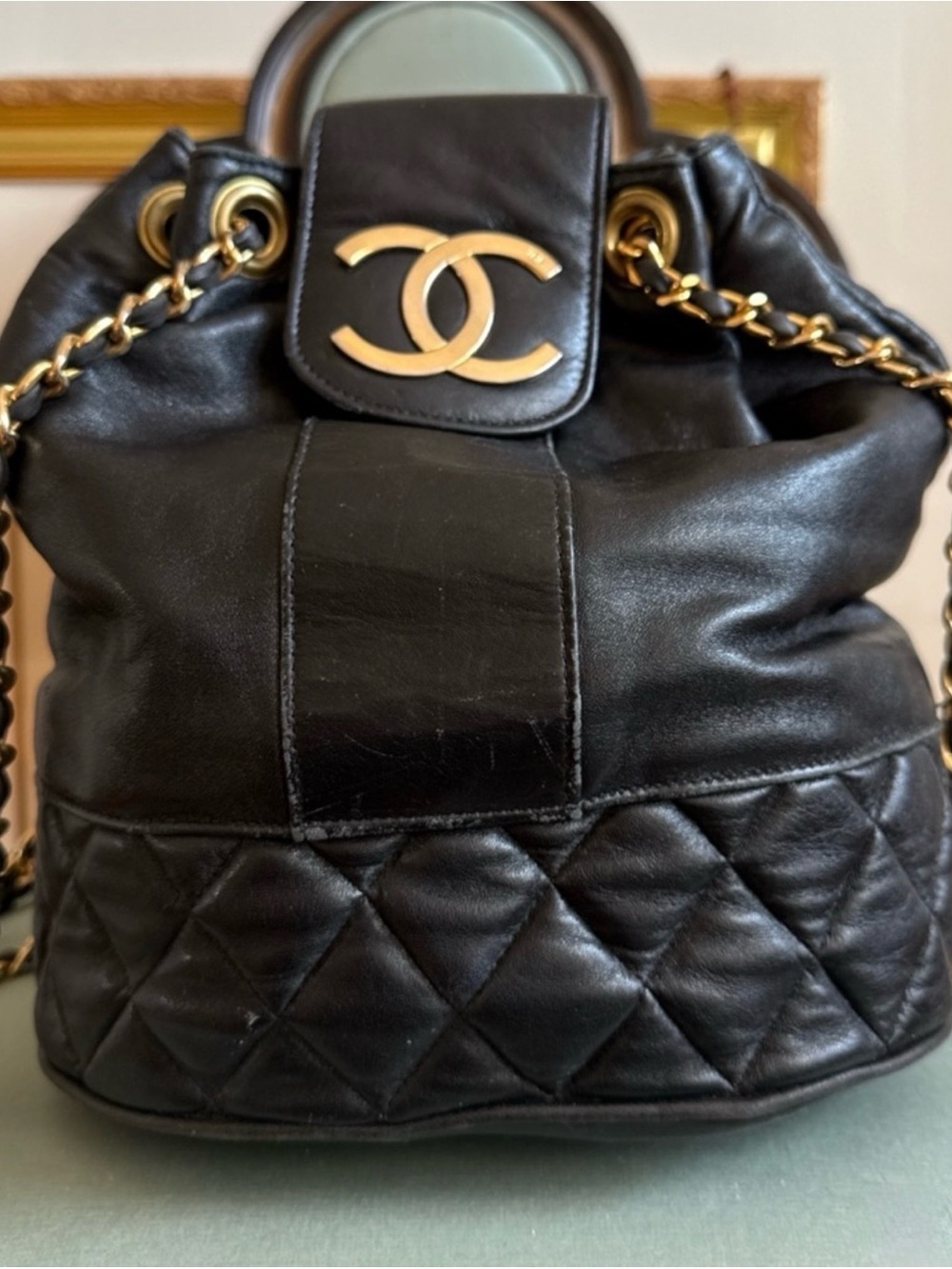 Black Quilted Leather Bucket bag with Gold-Tone Hardware